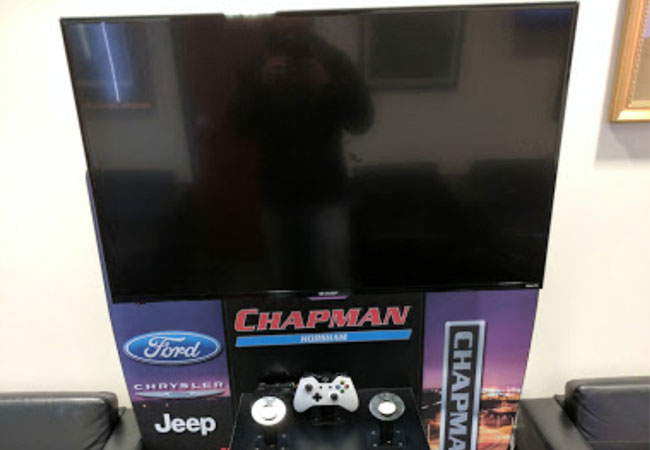 Chapman Ford Tire Flat Screen TV